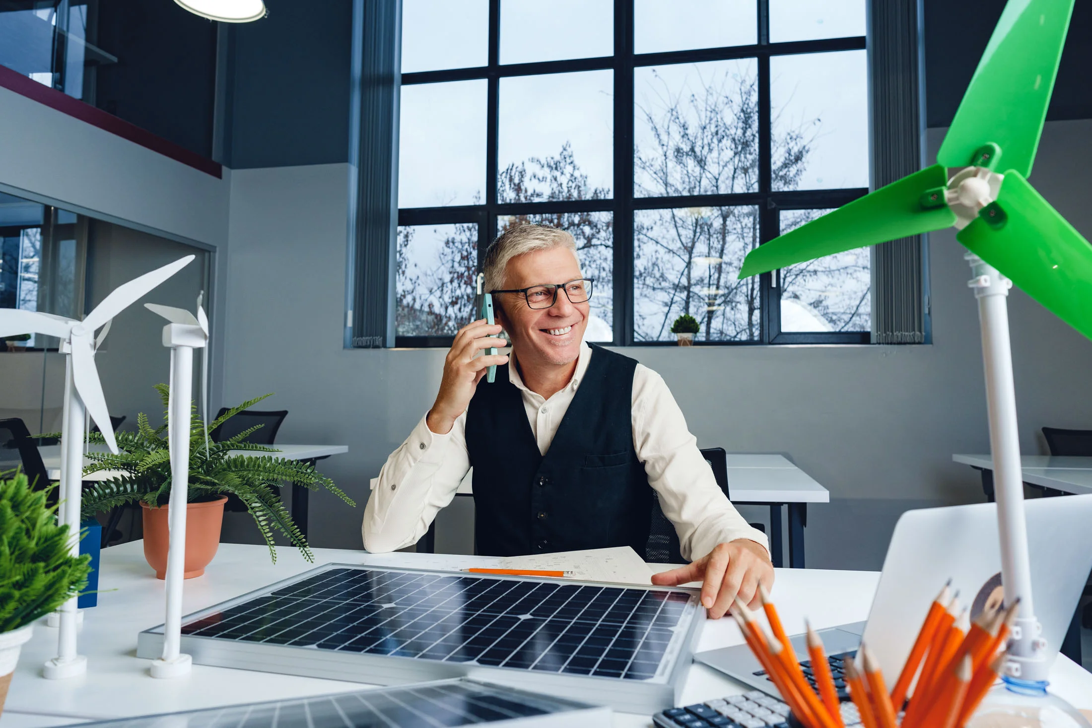 male-mature-architect-working-ecological-construction-project-office